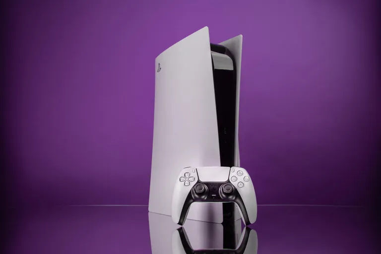 purple background with a white playstation 5 controller in front of a white playstation 5